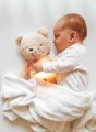 Przytulanka Szumiś dla niemowlaka