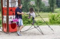 Rowerek biegowy jeździk 2w1 fioletowy z fioletowymi felgami ciche koła pasek do noszenia FWRider łatwy do przenoszenia